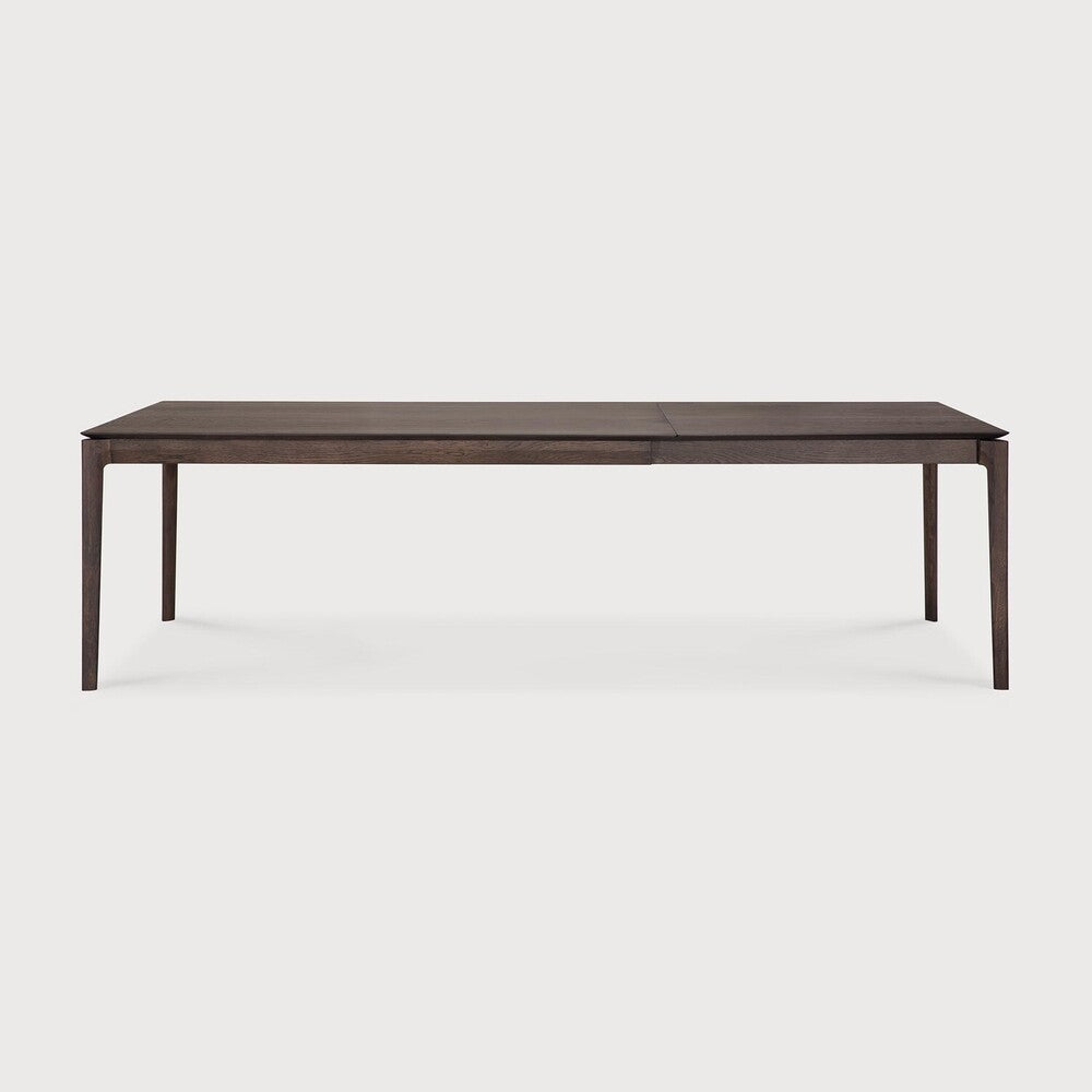 Ethnicraft Bok Extendable Dining Table in oak styled in a dining room