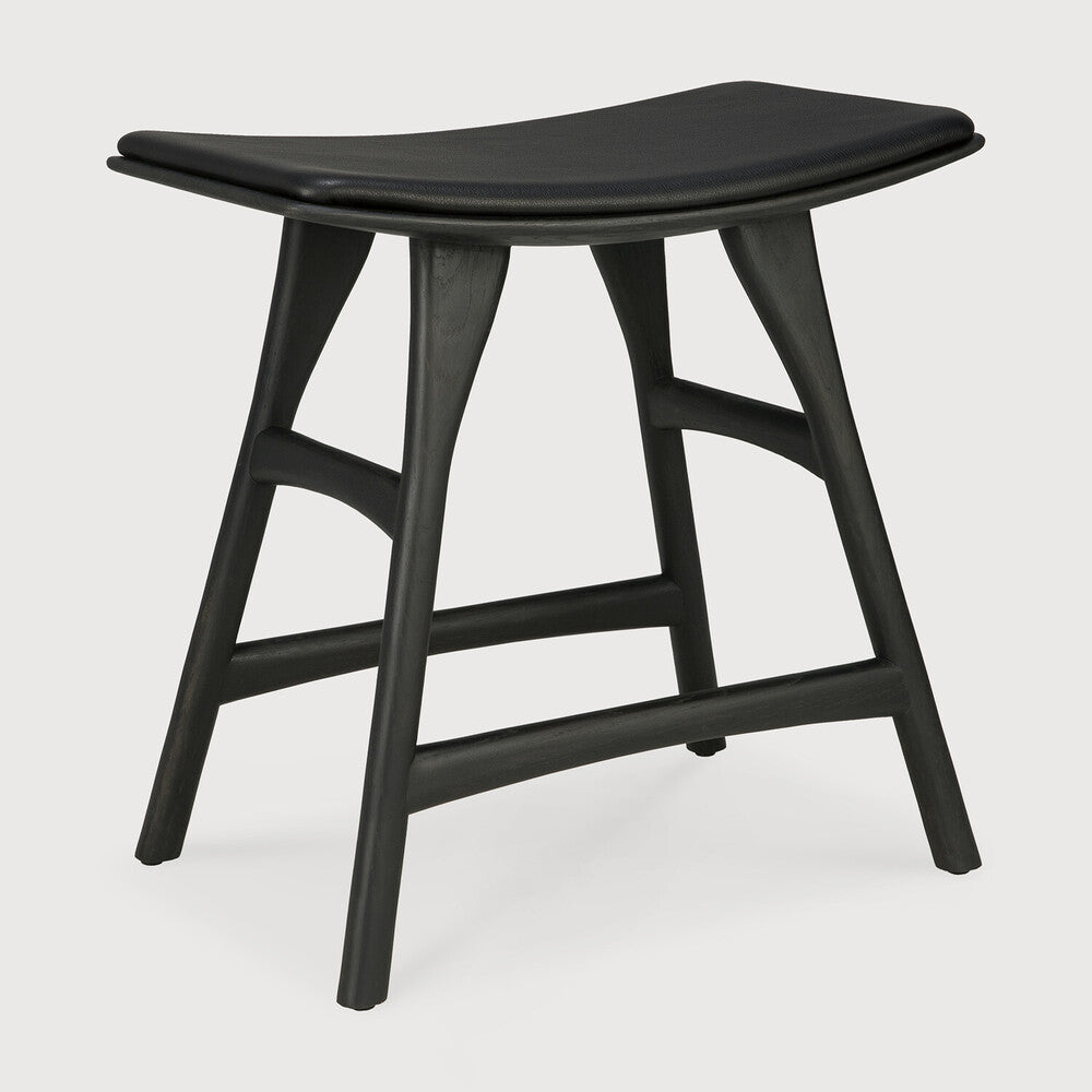 Ethnicraft Osso Stool in oak styled in a dining room