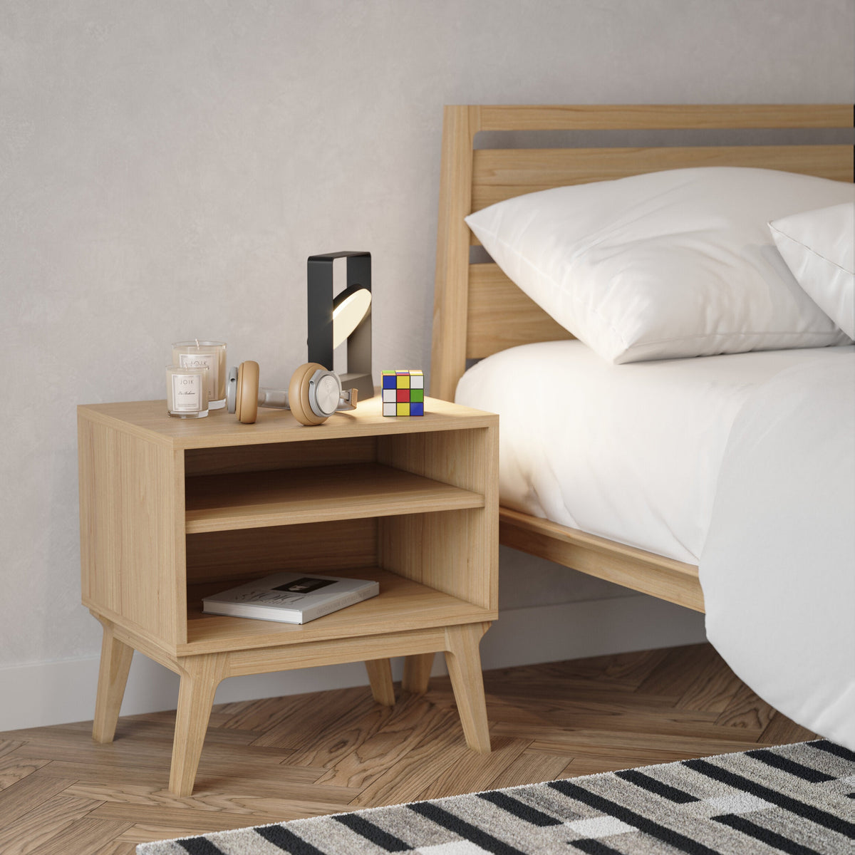 Case Valentine Bedside Table in Oak next to the Valentine Bed, styled in a bedroom, solid oak and oak veneer