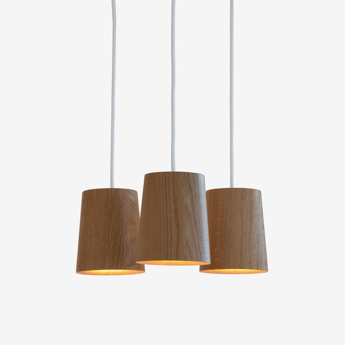 Case Solid Three Pendant Cluster in Oak, cones hung level, solid oak
