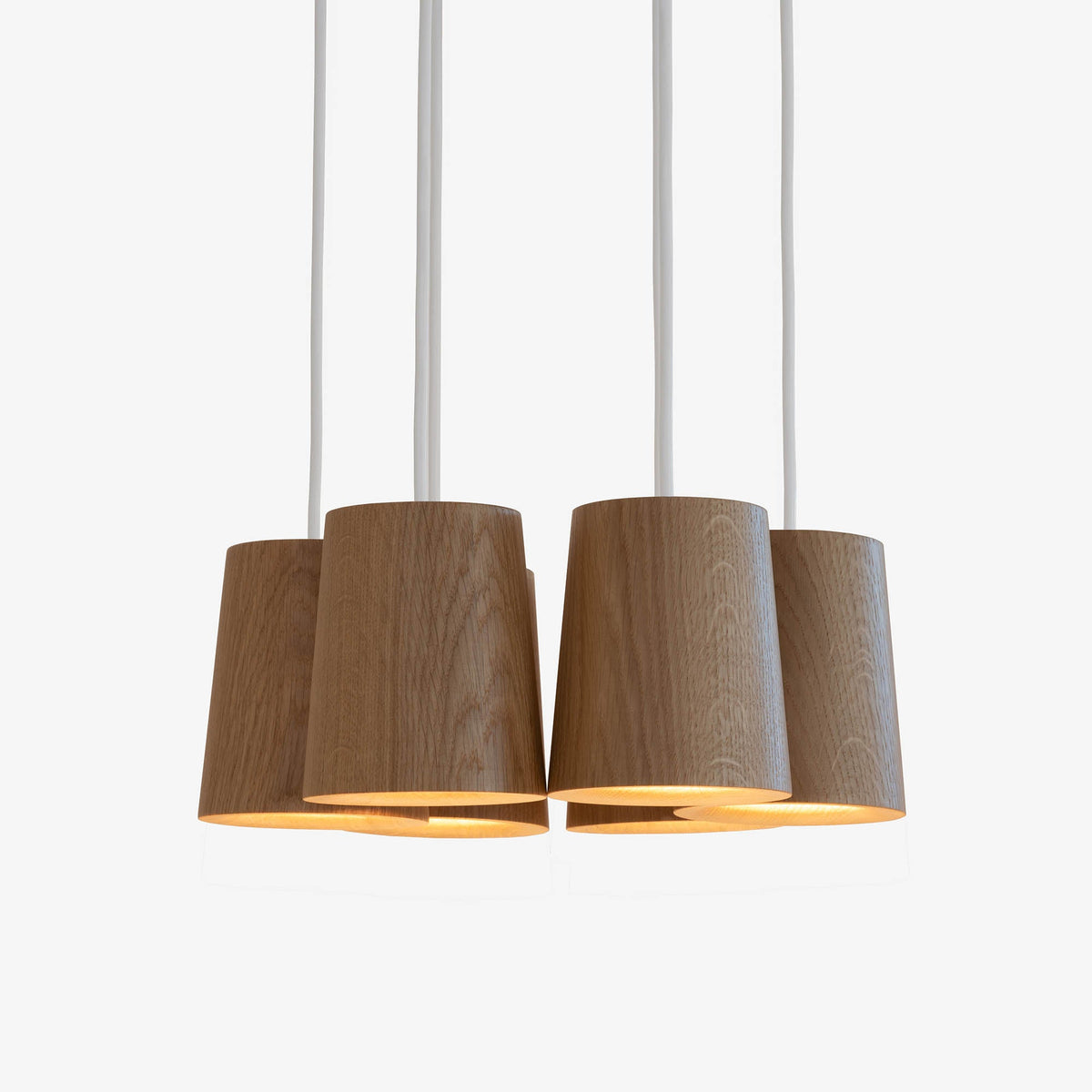Case Solid Six Pendant Cluster in Oak, cones hung level, solid oak