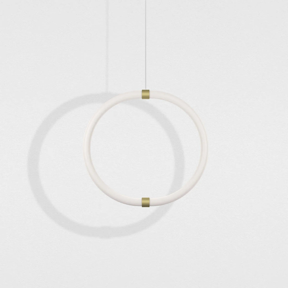 Petite Friture Unseen O pendant light, a white glass ring with brass fittings