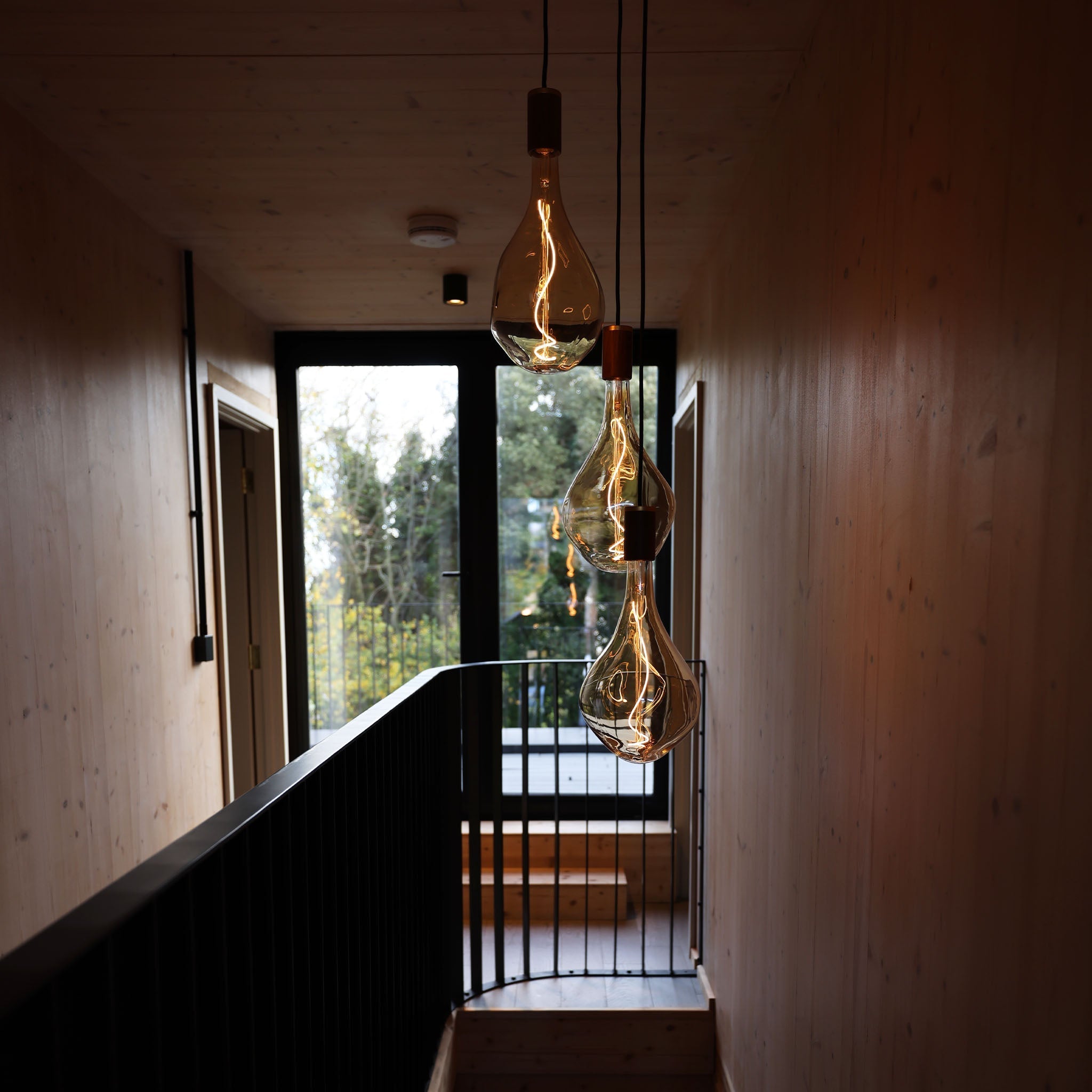 Tala Triple Pendant in Graphite with Voronoi III bulbs — alternate view