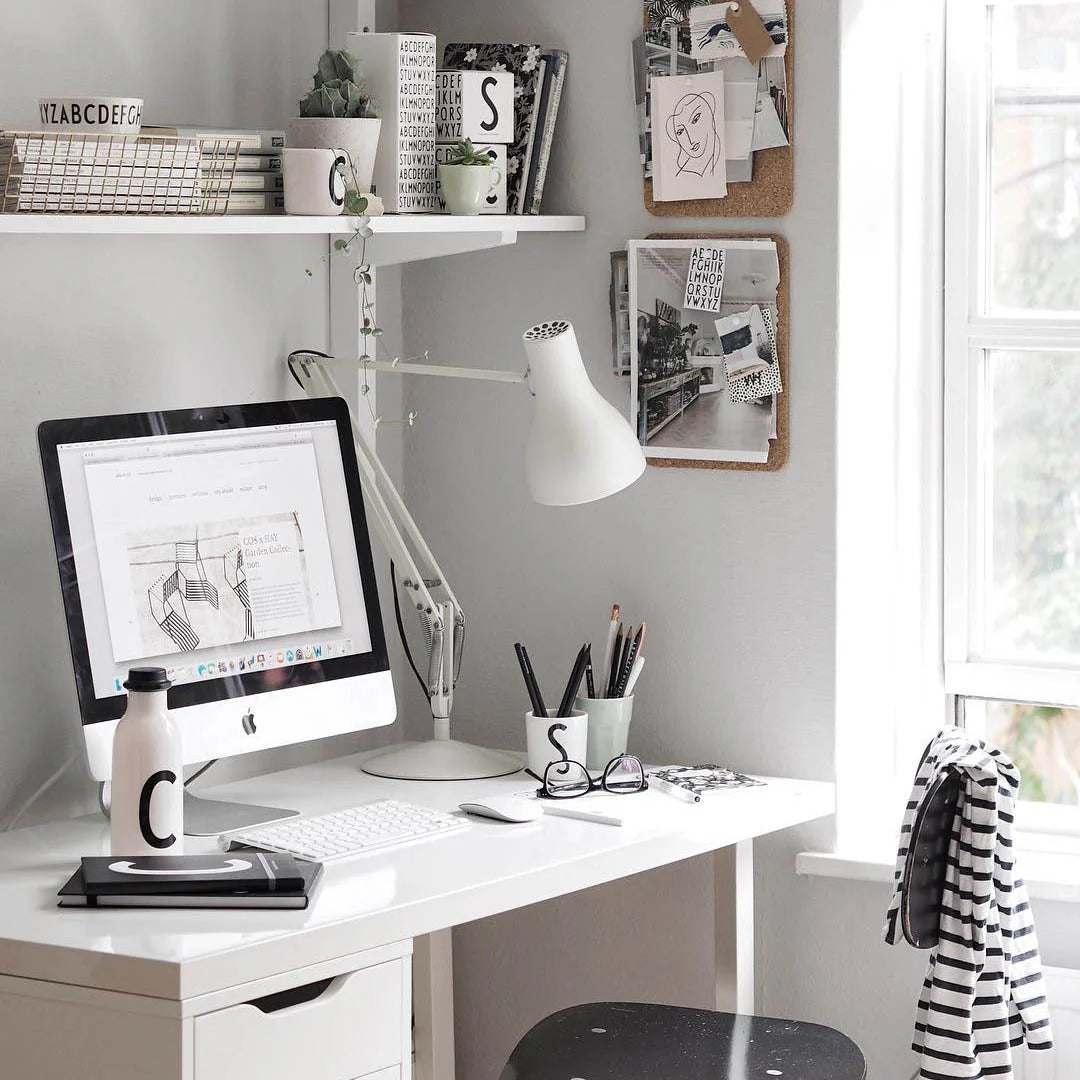 Anglepoise Type 75 desk lamp in Alpine White on a white home-office desk