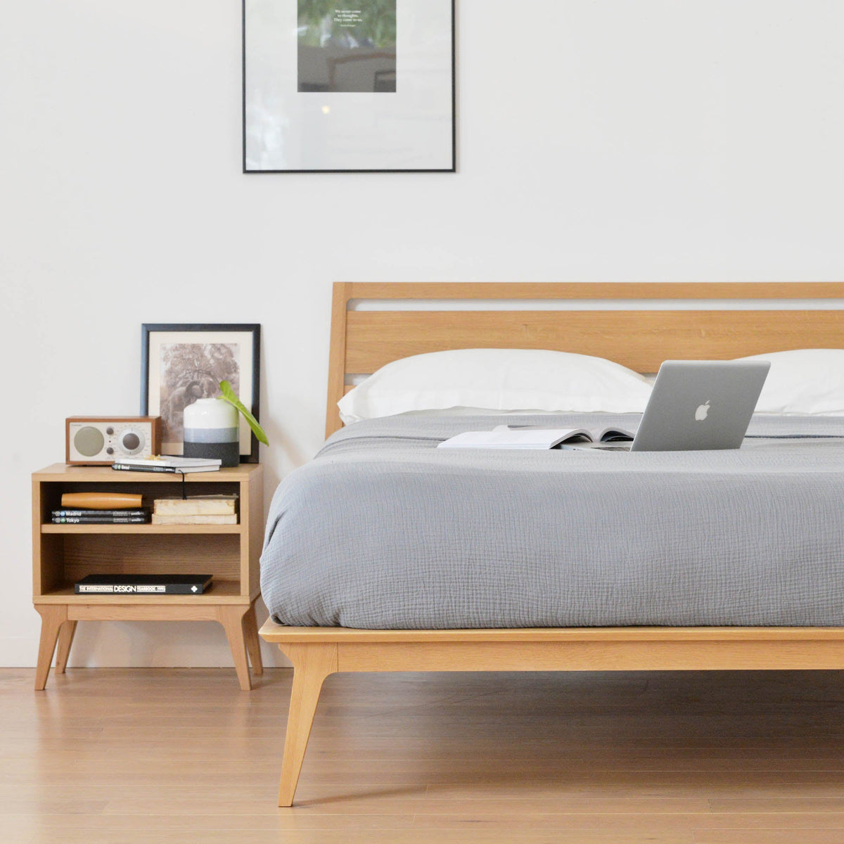 Case Valentine Bed in Oak with slatted headboard, styled in a bedroom, solid oak