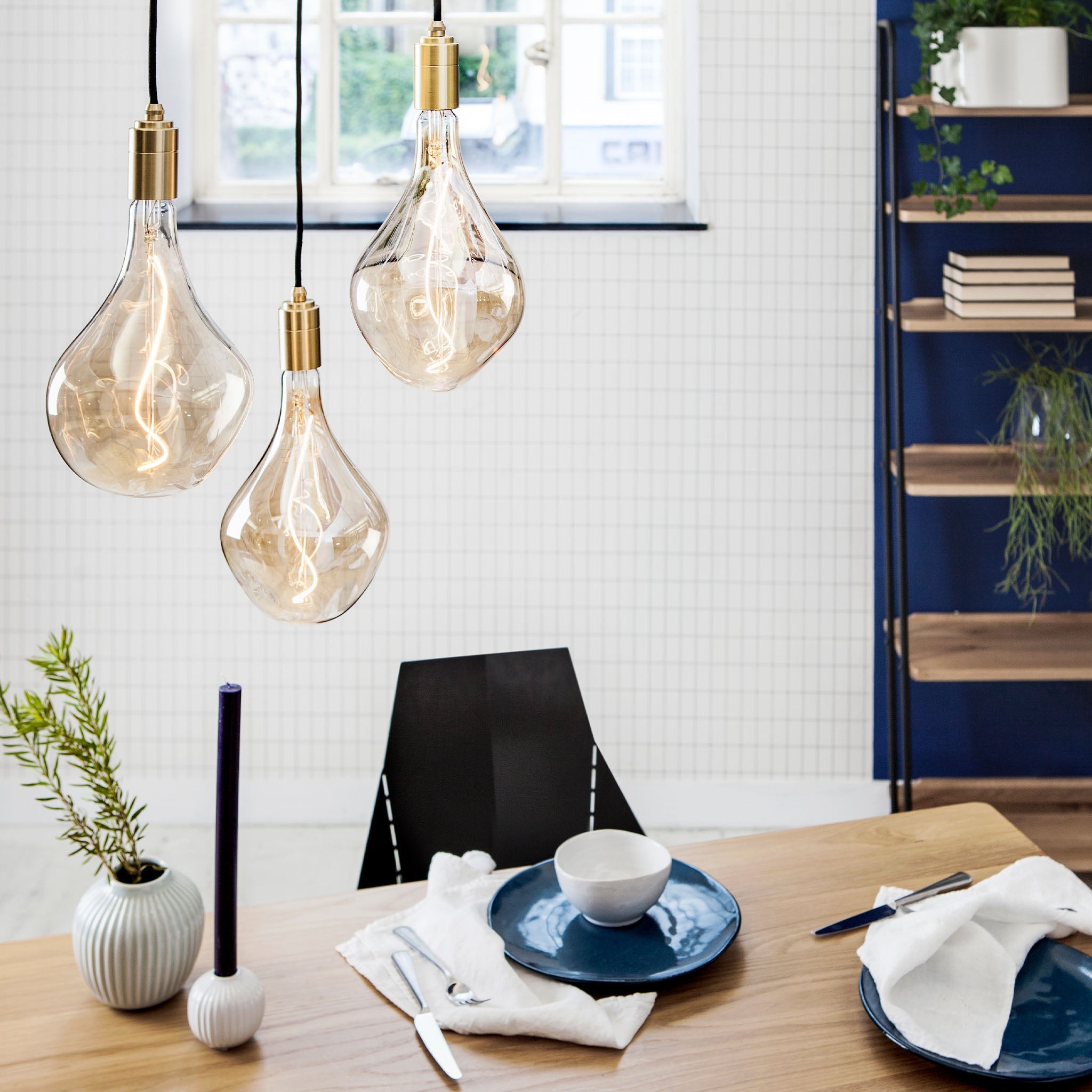 Tala Triple Pendant in Brass with Voronoi II bulbs — dining room lifestyle alternate