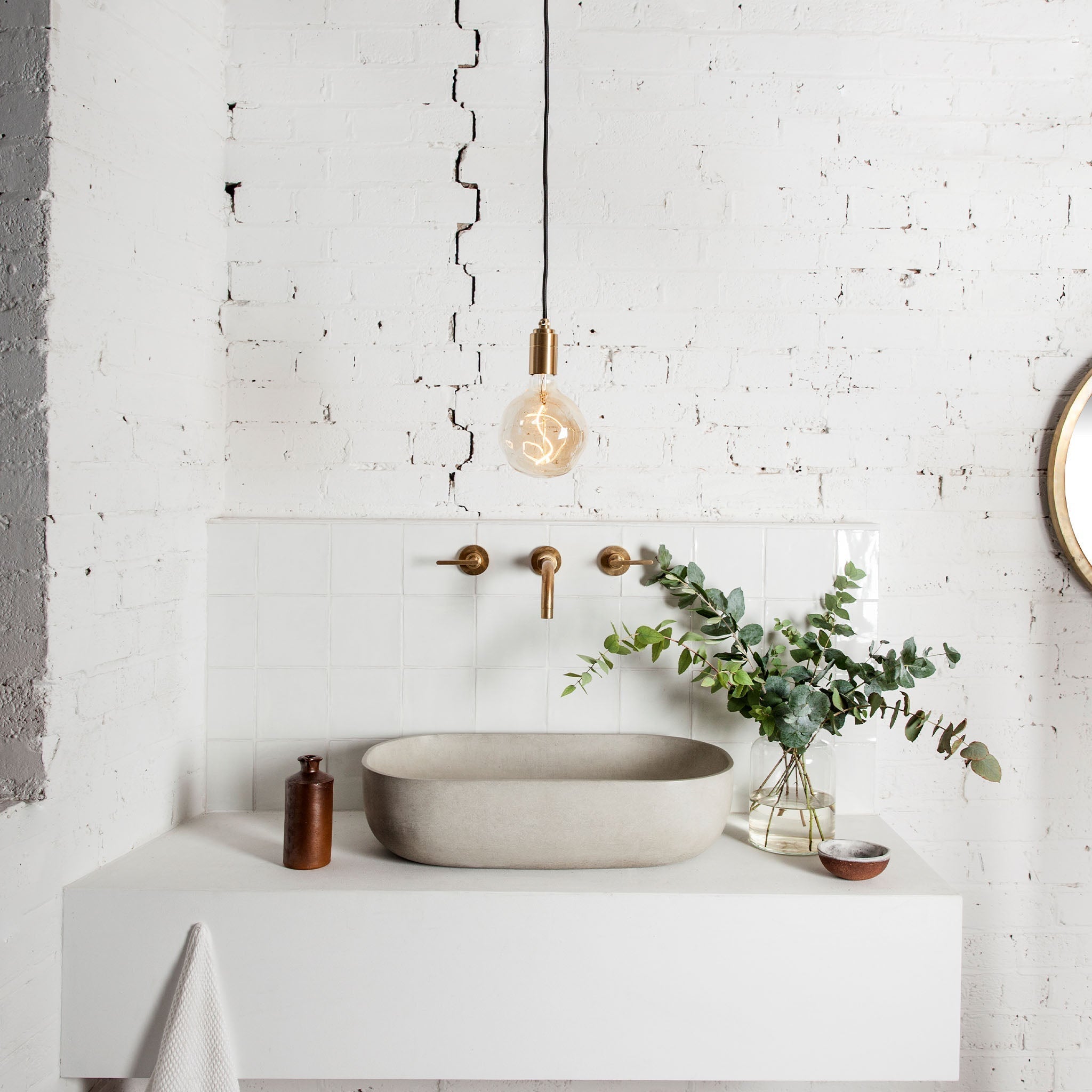 Tala Voronoi I Plug-In Pendant in Brass hanging in a bathroom