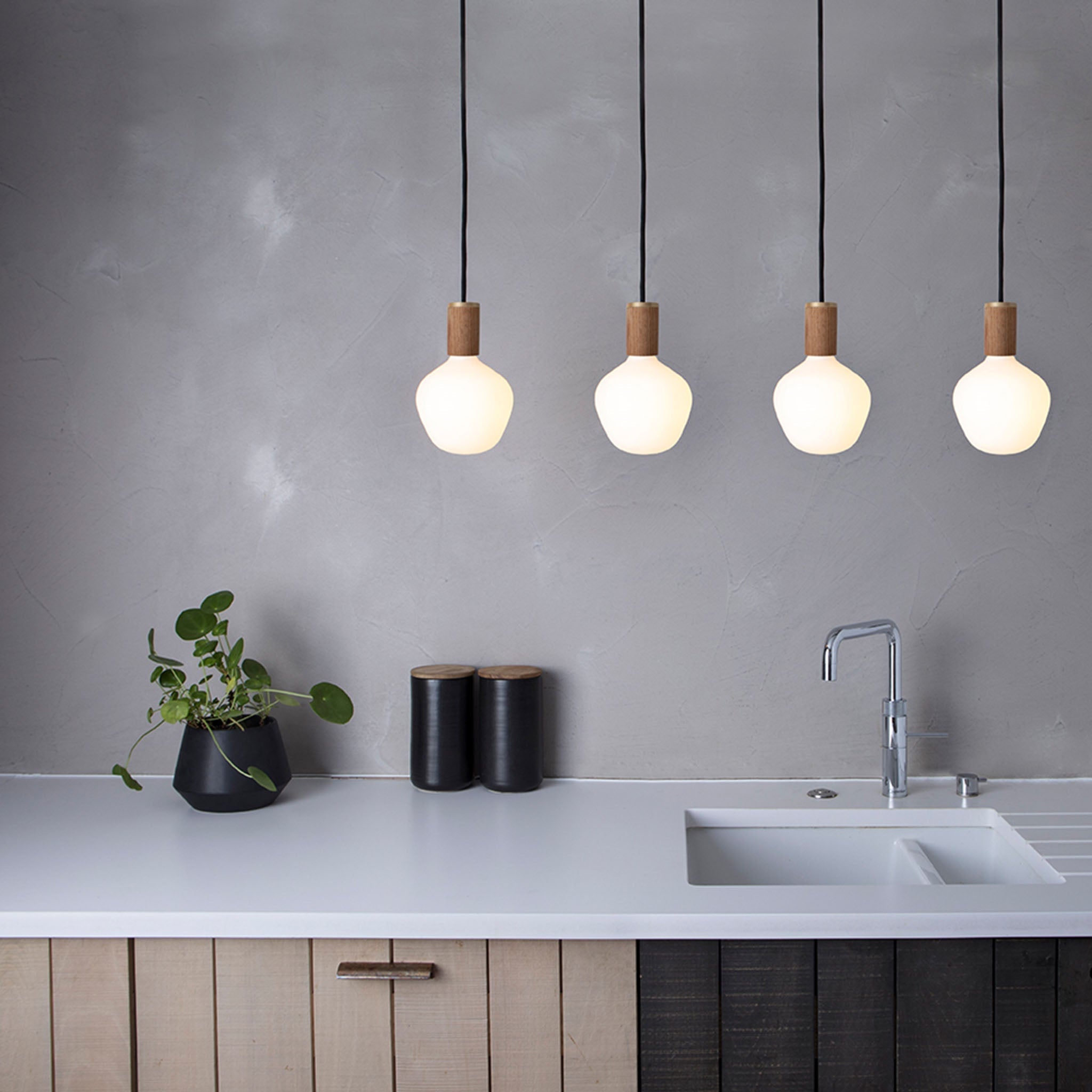 Close-up of the brass canopy on the Enno Pendant Light